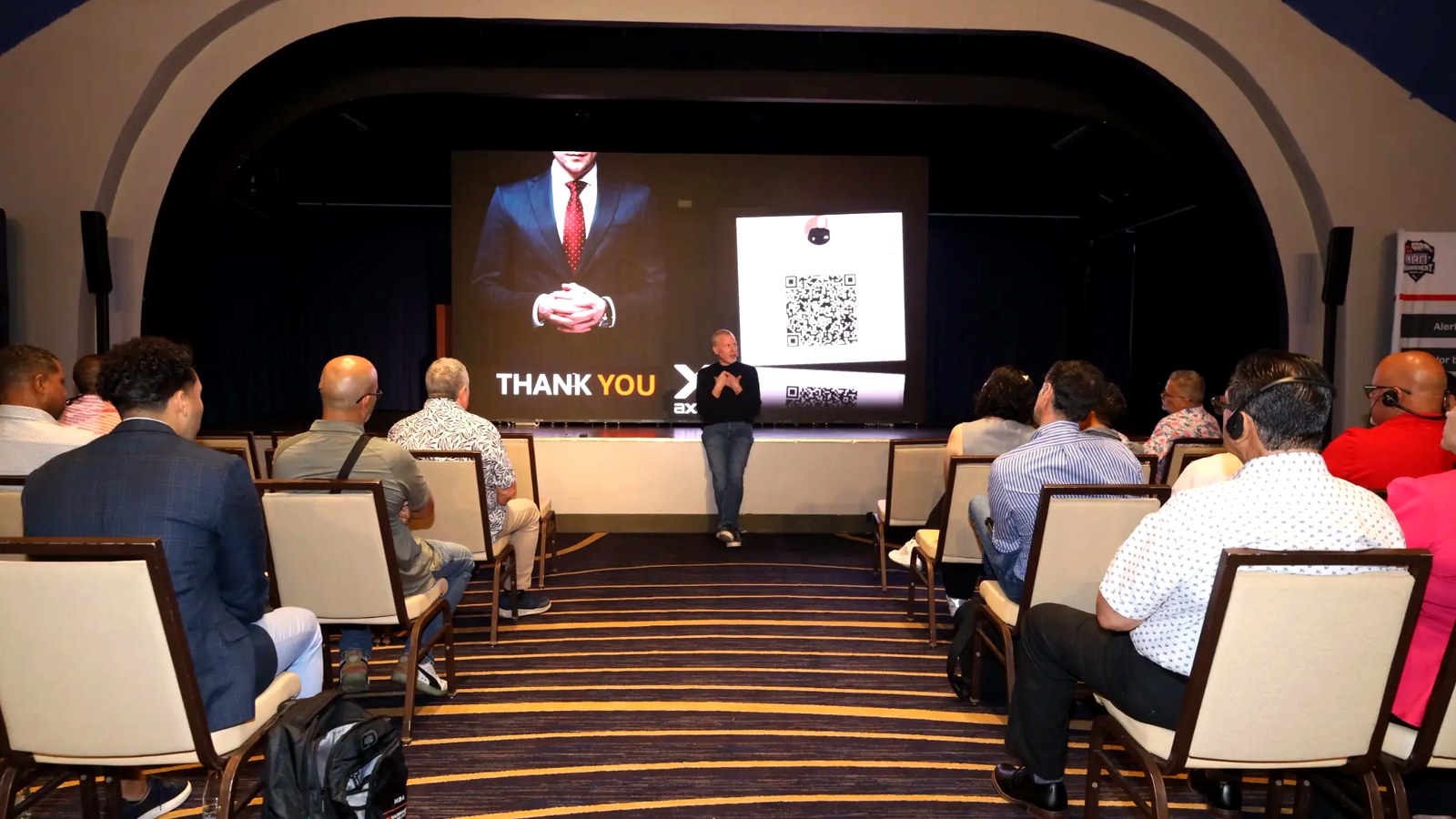 The closing keynote — a packed room, a Thank You slide, and a standing ovation.